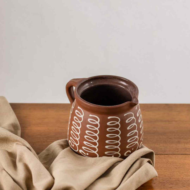 Krugvase, arrangiert