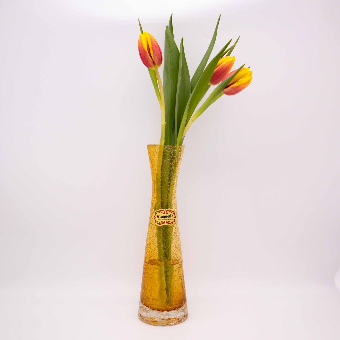 Gelbe Craquelé Vase von Ingrid Glas, mit Blumen